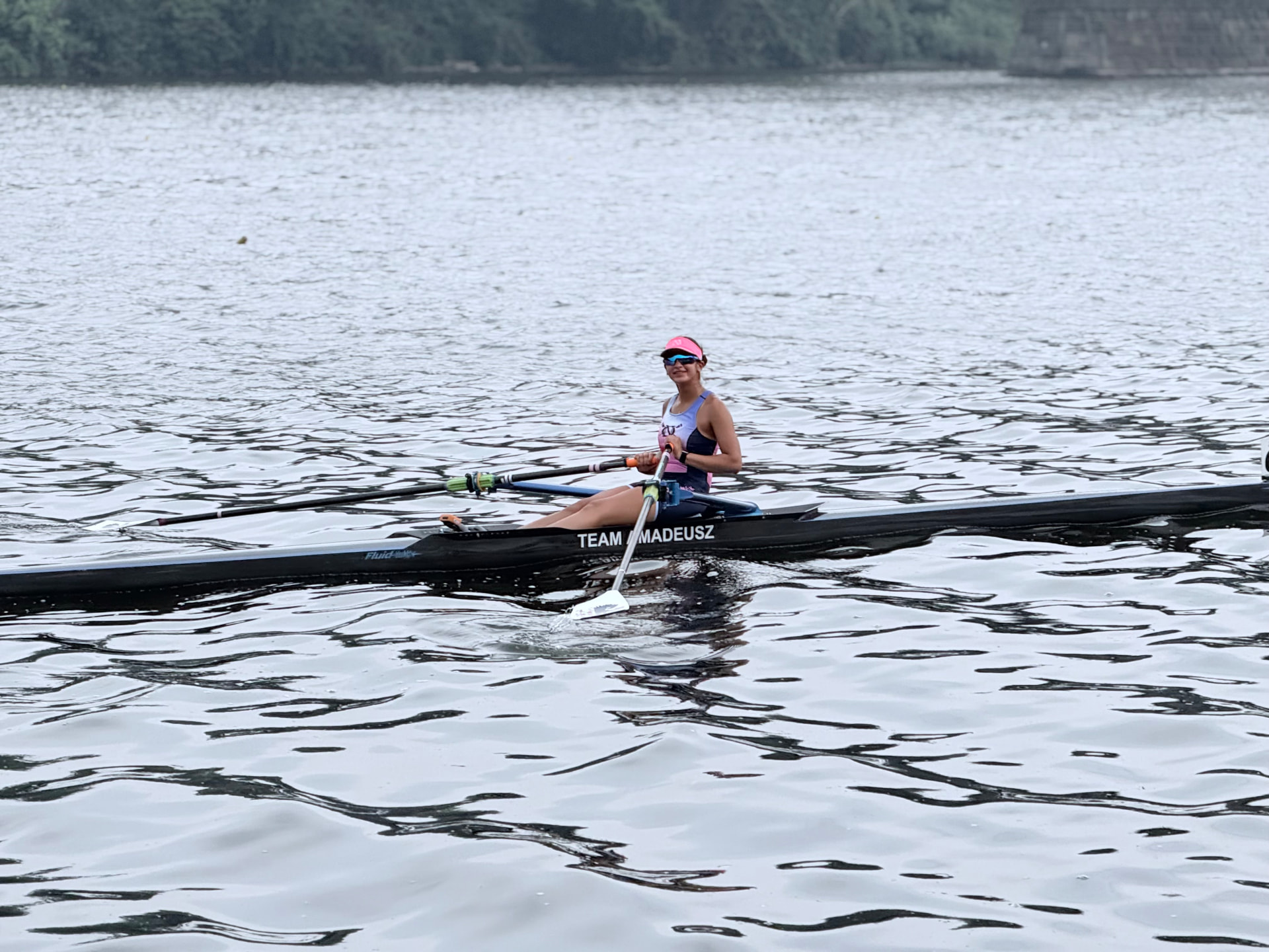 Krisha Wadhwa rowing with her crew during a regatta
